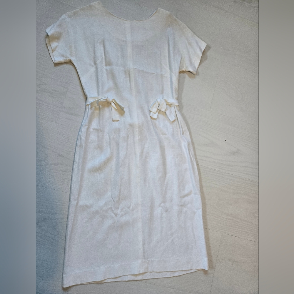 Elegant White Dress with Bow Accents